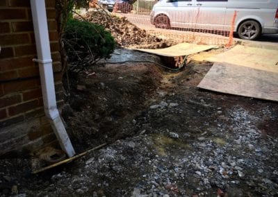 Trenching out soakaway pipework
